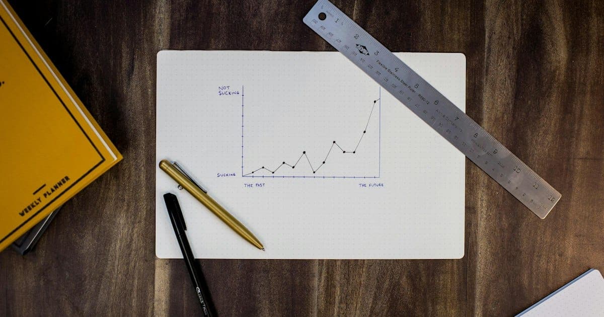 Data analyst configuring Excel table properties on office workstation