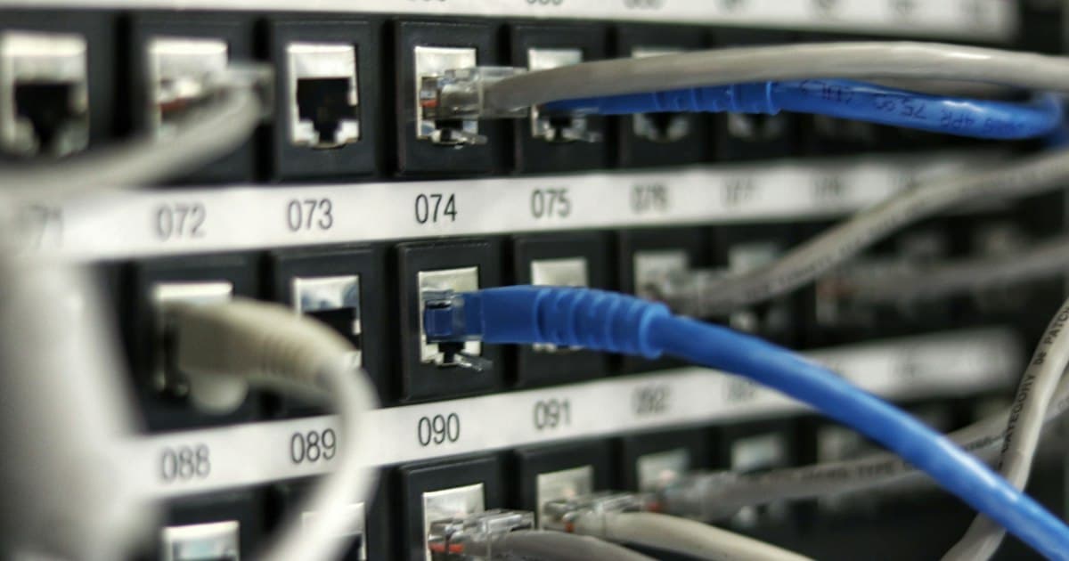 Enterprise server room with organized patch cabling connecting server racks